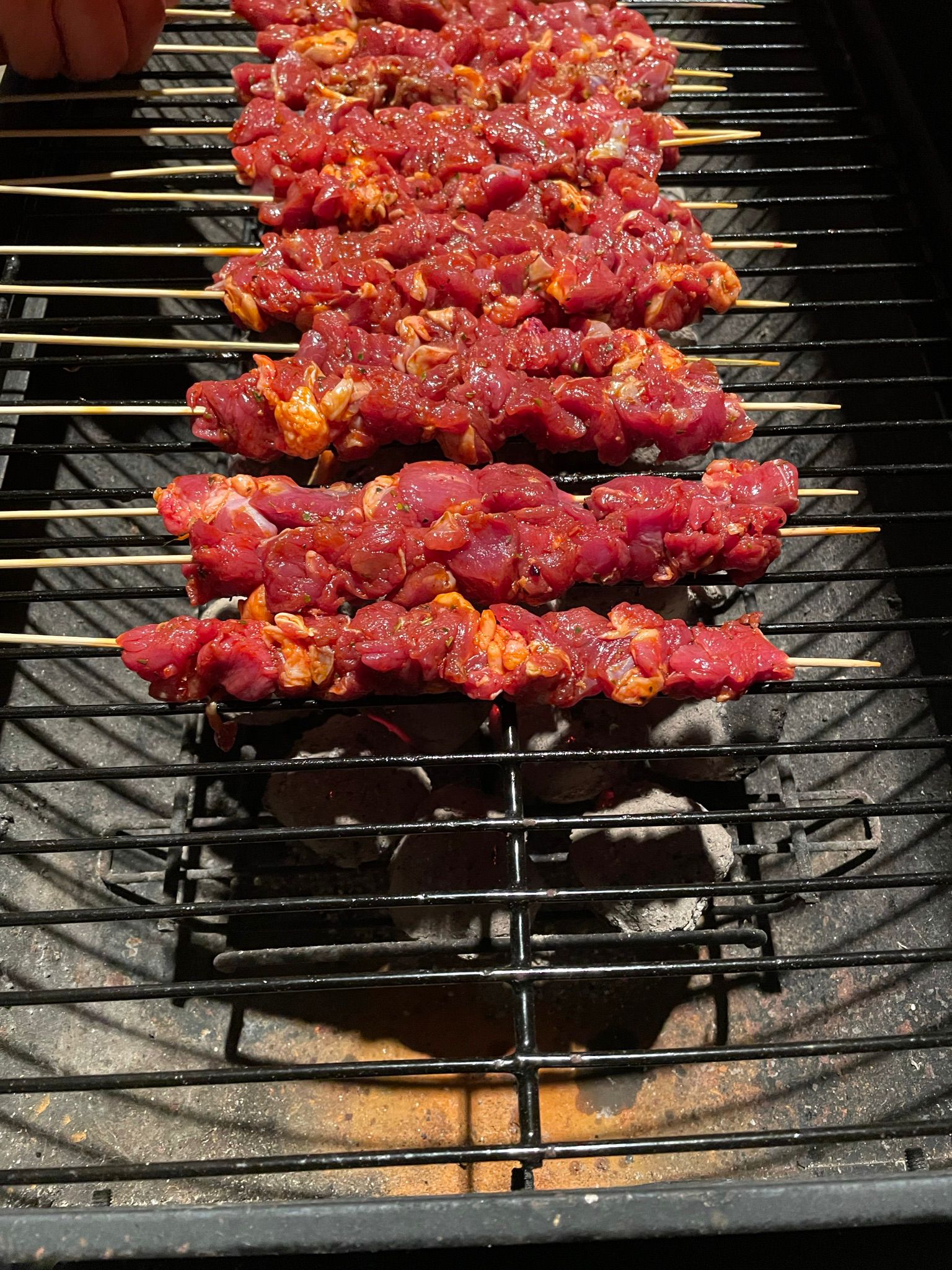 Fresh meat skewers on a barbecue